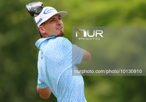 Sam Bennett of Madisonville, Texas hits from the 18th tee during The Memorial Tournament presented by Workday at Muirfield Village Golf Club...