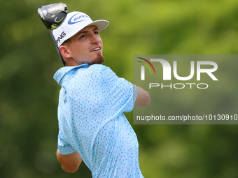 Sam Bennett of Madisonville, Texas hits from the 18th tee during The Memorial Tournament presented by Workday at Muirfield Village Golf Club...