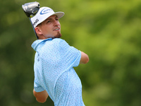 Sam Bennett of Madisonville, Texas hits from the 18th tee during The Memorial Tournament presented by Workday at Muirfield Village Golf Club...