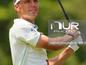 Eric Cole of Delray Beach, Florida hits from the 18th tee during The Memorial Tournament presented by Workday at Muirfield Village Golf Club...