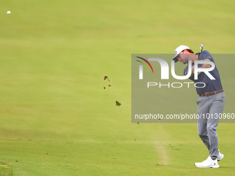 Austin Eckroat hits from the 18th fairway during The Memorial Tournament presented by Workday at Muirfield Village Golf Club in Dublin, Ohio...