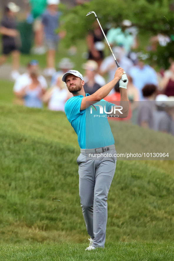 Wyndham Clark of Denver, Colorado hits from the 18th fairway during The Memorial Tournament presented by Workday at Muirfield Village Golf C...