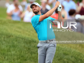 Wyndham Clark of Denver, Colorado hits from the 18th fairway during The Memorial Tournament presented by Workday at Muirfield Village Golf C...