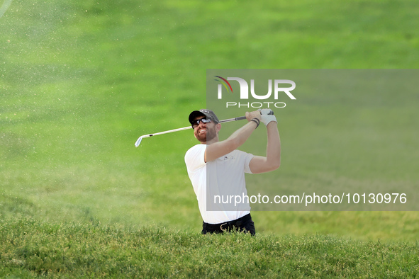 Patrick Rodgers of Jupiter, Florida hits from the 18th fairway during The Memorial Tournament presented by Workday at Muirfield Village Golf...