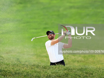 Patrick Rodgers of Jupiter, Florida hits from the 18th fairway during The Memorial Tournament presented by Workday at Muirfield Village Golf...