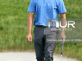 Patrick Cantlay of Jupiter, Florida walks on the 18th green during The Memorial Tournament presented by Workday at Muirfield Village Golf Cl...