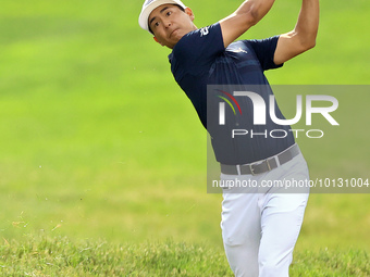 Justin Suh of San Jose, California hits from the 18th fairway during The Memorial Tournament presented by Workday at Muirfield Village Golf...