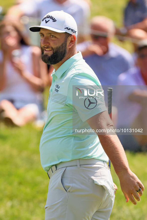 John Rahm of Barrika, Spain reacts after making his putt on the 9th green during  The Memorial Tournament presented by Workday at Muirfield...