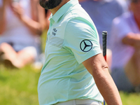 John Rahm of Barrika, Spain reacts after making his putt on the 9th green during  The Memorial Tournament presented by Workday at Muirfield...