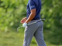 Joseph Bramlett of Las Vegas, Nevada walks on the 18th green after completing the second round during  The Memorial Tournament presented by...