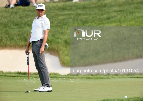 David Lipsky of Las Vegas, Nevada reacts to his putt on the 18th green during The Memorial Tournament presented by Workday at Muirfield Vill...