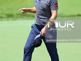 Seamus Power of Waterford, Ireland walks off the 18th green after completing the first round of the The Memorial Tournament presented by Wor...