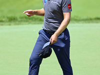 Seamus Power of Waterford, Ireland walks off the 18th green after completing the first round of the The Memorial Tournament presented by Wor...