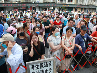 NANJING, CHINA - JUNE 7, 2023 - Parents wait outside a college entrance examination point in Nanjing, Jiangsu province, June 7, 2023. The 20...