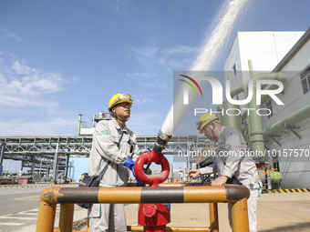 

Members of a chemical company are conducting a tank rescue drill in Huai'an City, Jiangsu Province, China, on June 12, 2023. (