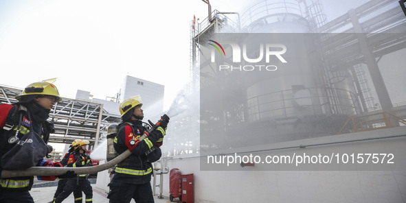 

Firefighters are performing a drill to stop a leak in a chemical pipeline in Huai'an City, East China's Jiangsu Province, on June 12, 2023...