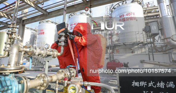 

Firefighters are performing a drill to stop a leak in a chemical pipeline in Huai'an City, East China's Jiangsu Province, on June 12, 2023...