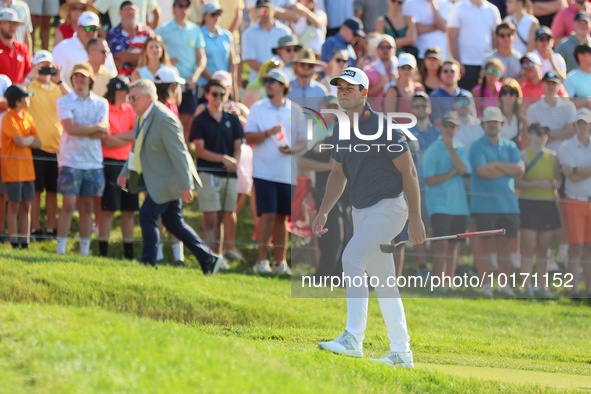 Viktor Hovland of Oslo, Norway approached the 18th green during a playoff against Denny McCarthy of Jupiter, Florida during the final round...