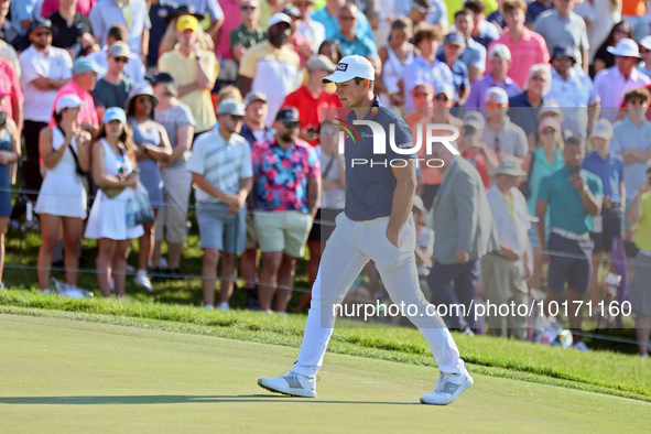 Viktor Hovland of Oslo, Norway approaches the 18th green during a playoff against Denny McCarthy of Jupiter, Florida during the final round...