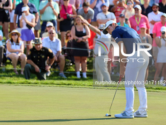 Viktor Hovland of Oslo, Norway putts on the 18th green during a playoff against Denny McCarthy of Jupiter, Florida during the final round of...