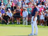 Viktor Hovland of Oslo, Norway reacts to his putt on the 18th green during a playoff against Denny McCarthy of Jupiter, Florida during the f...