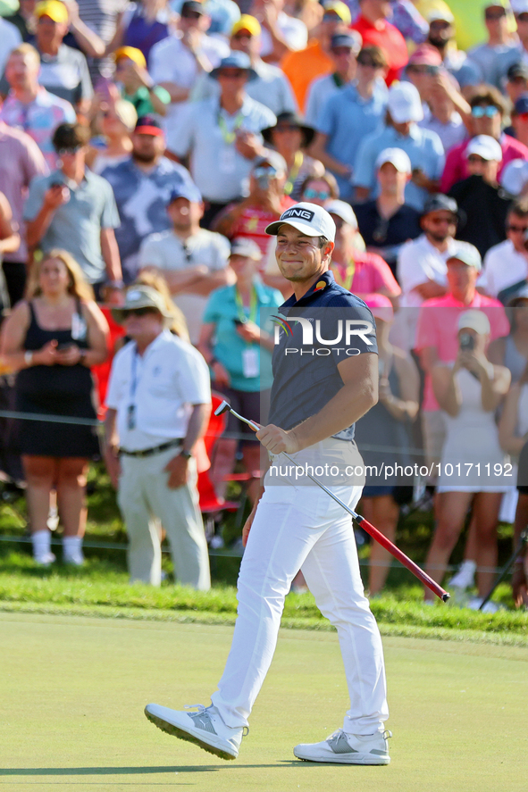 Viktor Hovland of Oslo, Norway reacts to his putt on the 18th green during a playoff against Denny McCarthy of Jupiter, Florida during the f...