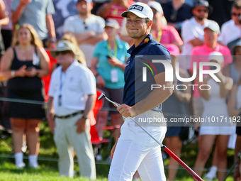 Viktor Hovland of Oslo, Norway reacts to his putt on the 18th green during a playoff against Denny McCarthy of Jupiter, Florida during the f...