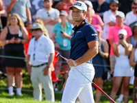 Viktor Hovland of Oslo, Norway reacts to his putt on the 18th green during a playoff against Denny McCarthy of Jupiter, Florida during the f...