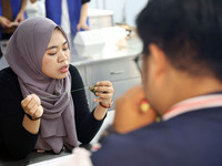 Foreign students make perfume sachets at the School of International Education at Nantong Vocational College of Science and Technology in Na...