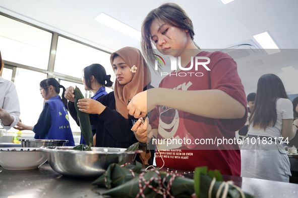 Teachers and students from the School of Environmental and Biological Engineering at Nantong Vocational College of Science and Technology te...