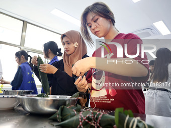 Teachers and students from the School of Environmental and Biological Engineering at Nantong Vocational College of Science and Technology te...