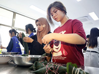 Teachers and students from the School of Environmental and Biological Engineering at Nantong Vocational College of Science and Technology te...