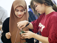 Teachers and students from the School of Environmental and Biological Engineering at Nantong Vocational College of Science and Technology te...