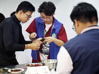 Teachers and students from the School of Environmental and Biological Engineering at Nantong Vocational College of Science and Technology te...