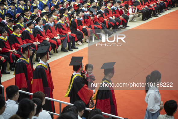 A general view of the 2023 graduation ceremony of China University of Petroleum in Qingdao, Shandong Province, China, June 20, 2023. Thousan...