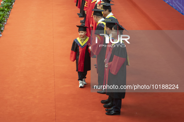 A general view of the 2023 graduation ceremony of China University of Petroleum in Qingdao, Shandong Province, China, June 20, 2023. Thousan...