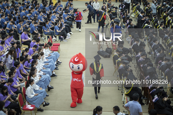 A general view of the 2023 graduation ceremony of China University of Petroleum in Qingdao, Shandong Province, China, June 20, 2023. Thousan...