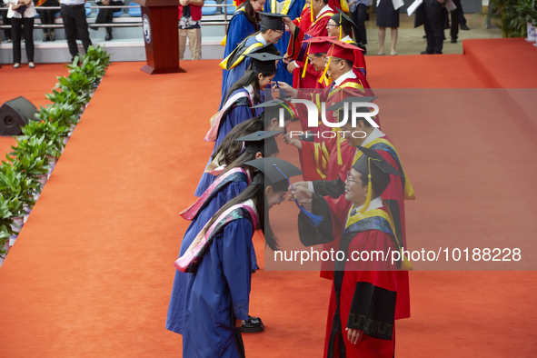 A general view of the 2023 graduation ceremony of China University of Petroleum in Qingdao, Shandong Province, China, June 20, 2023. Thousan...