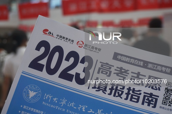  Students and their parents learn about enrollment information at the Zhejiang 2023 College Enrollment Public Consultation in Hangzhou, East...