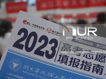  Students and their parents learn about enrollment information at the Zhejiang 2023 College Enrollment Public Consultation in Hangzhou, East...