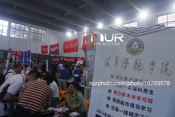  Students and their parents learn about enrollment information at the Zhejiang 2023 College Enrollment Public Consultation in Hangzhou, East...