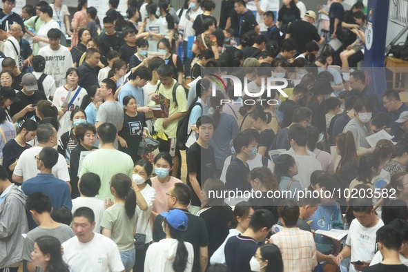  Students and their parents learn about enrollment information at the Zhejiang 2023 College Enrollment Public Consultation in Hangzhou, East...