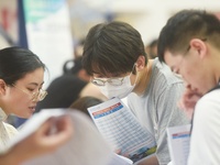  Students and their parents learn about enrollment information at the Zhejiang 2023 College Enrollment Public Consultation in Hangzhou, East...