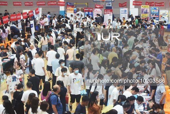  Students and their parents learn about enrollment information at the Zhejiang 2023 College Enrollment Public Consultation in Hangzhou, East...