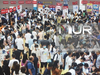  Students and their parents learn about enrollment information at the Zhejiang 2023 College Enrollment Public Consultation in Hangzhou, East...