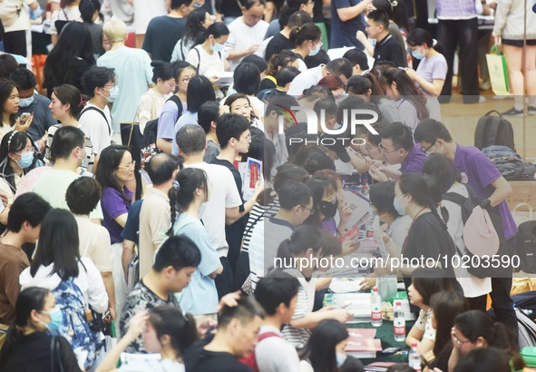  Students and their parents learn about enrollment information at the Zhejiang 2023 College Enrollment Public Consultation in Hangzhou, East...