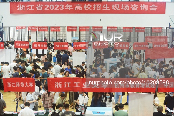  Students and their parents learn about enrollment information at the Zhejiang 2023 College Enrollment Public Consultation in Hangzhou, East...