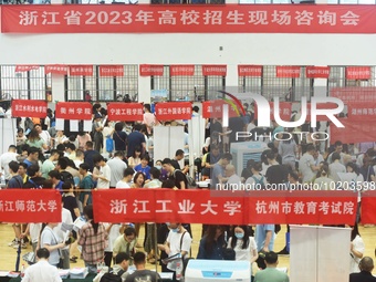  Students and their parents learn about enrollment information at the Zhejiang 2023 College Enrollment Public Consultation in Hangzhou, East...