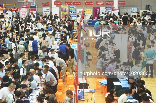  Students and their parents learn about enrollment information at the Zhejiang 2023 College Enrollment Public Consultation in Hangzhou, East...