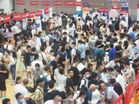  Students and their parents learn about enrollment information at the Zhejiang 2023 College Enrollment Public Consultation in Hangzhou, East...